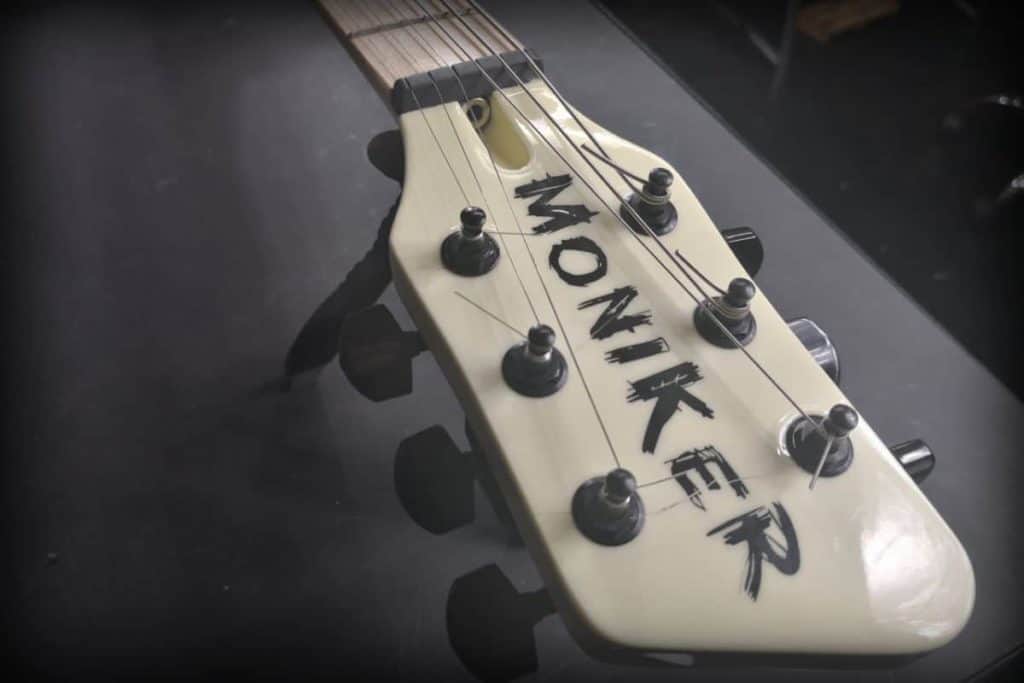 Moniker Guitars headstock strung up