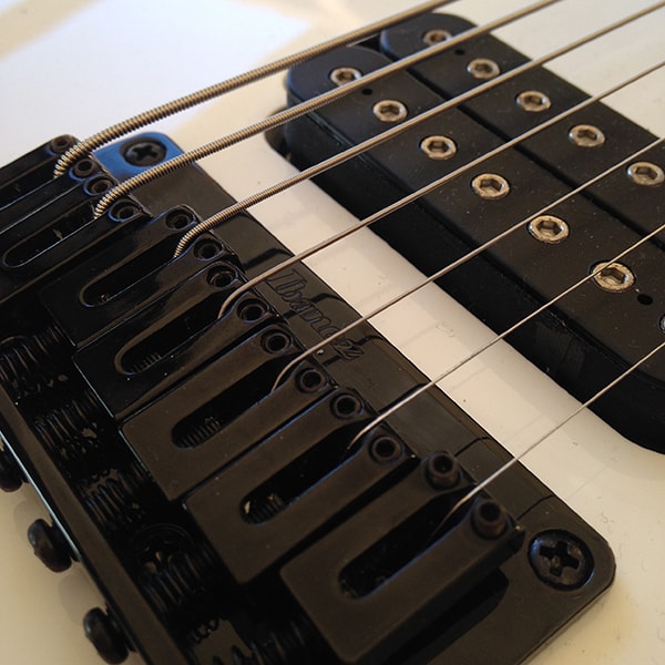 Stringjoy strings in an Ibanez bridge