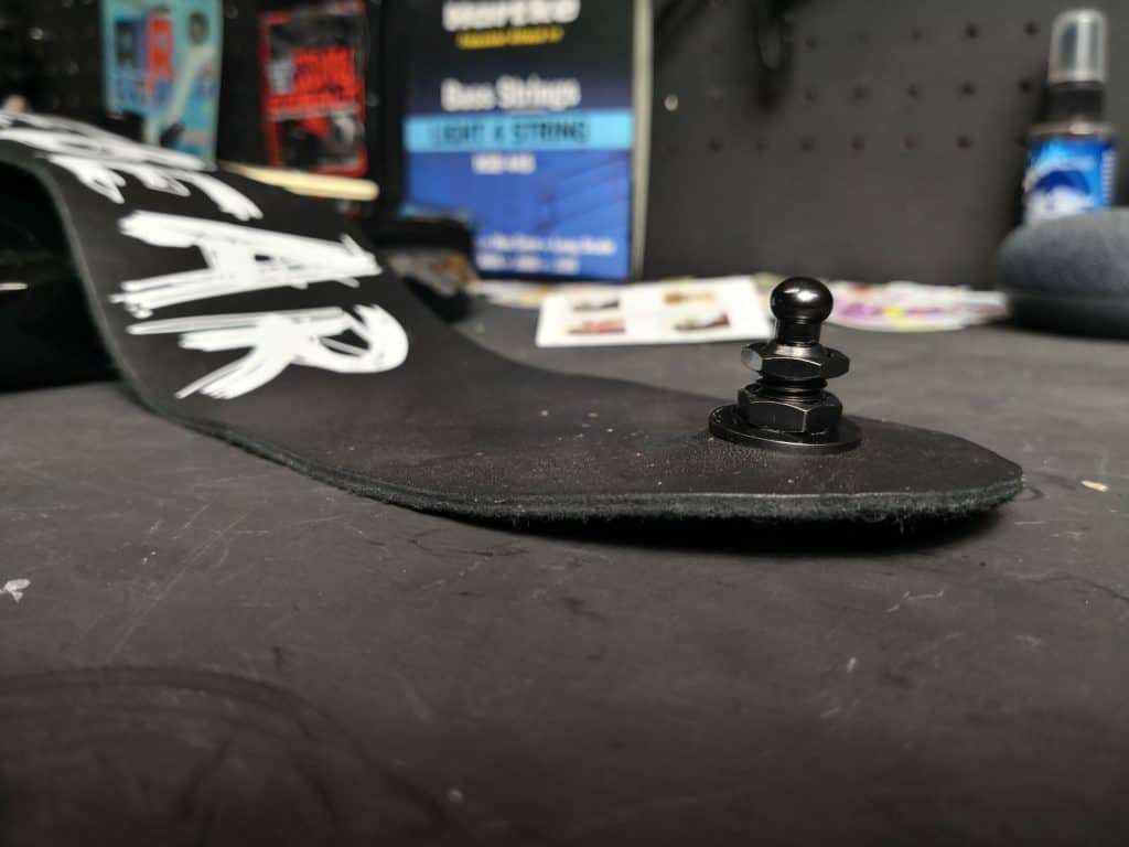 PLB guitar strap nuts in place